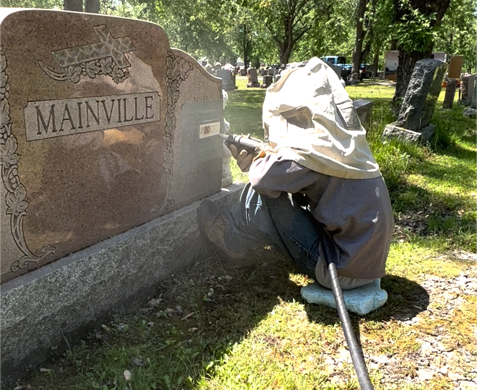 Cemetery Lettering Technician Sandblasting a Monument in Cornwall, Ontario